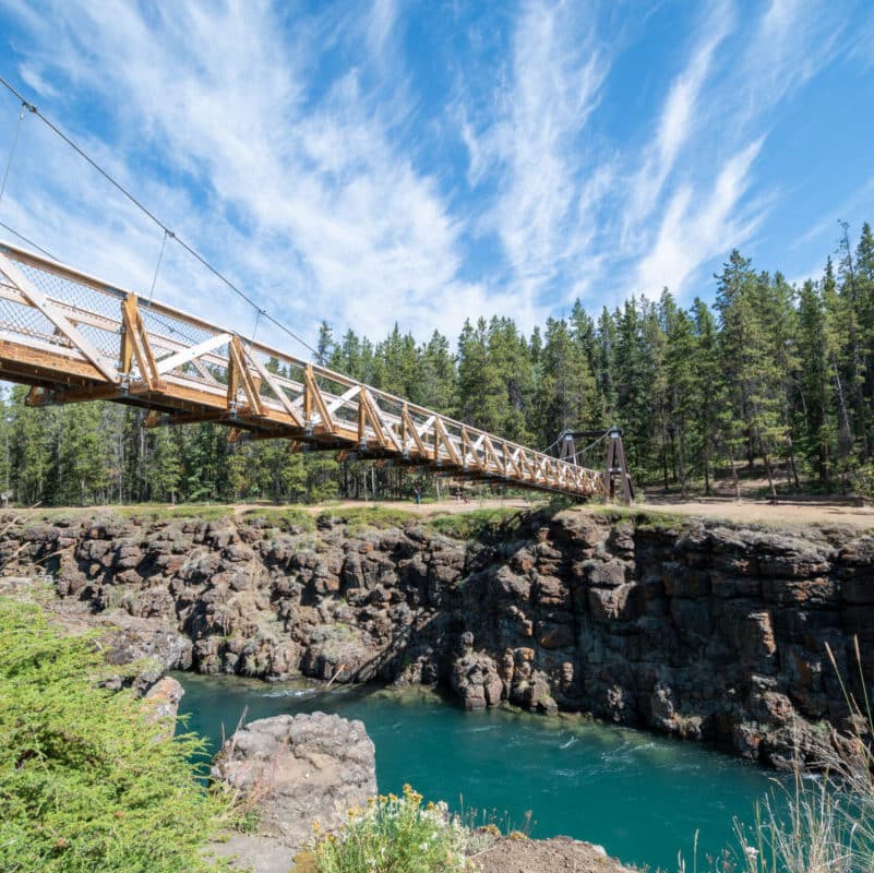 https://www.discovercanadatours.com/wp-content/uploads/2022/05/Government-of-Yukon-Miles-Canyon-Whitehorse-scaled-e1657212740220.jpg