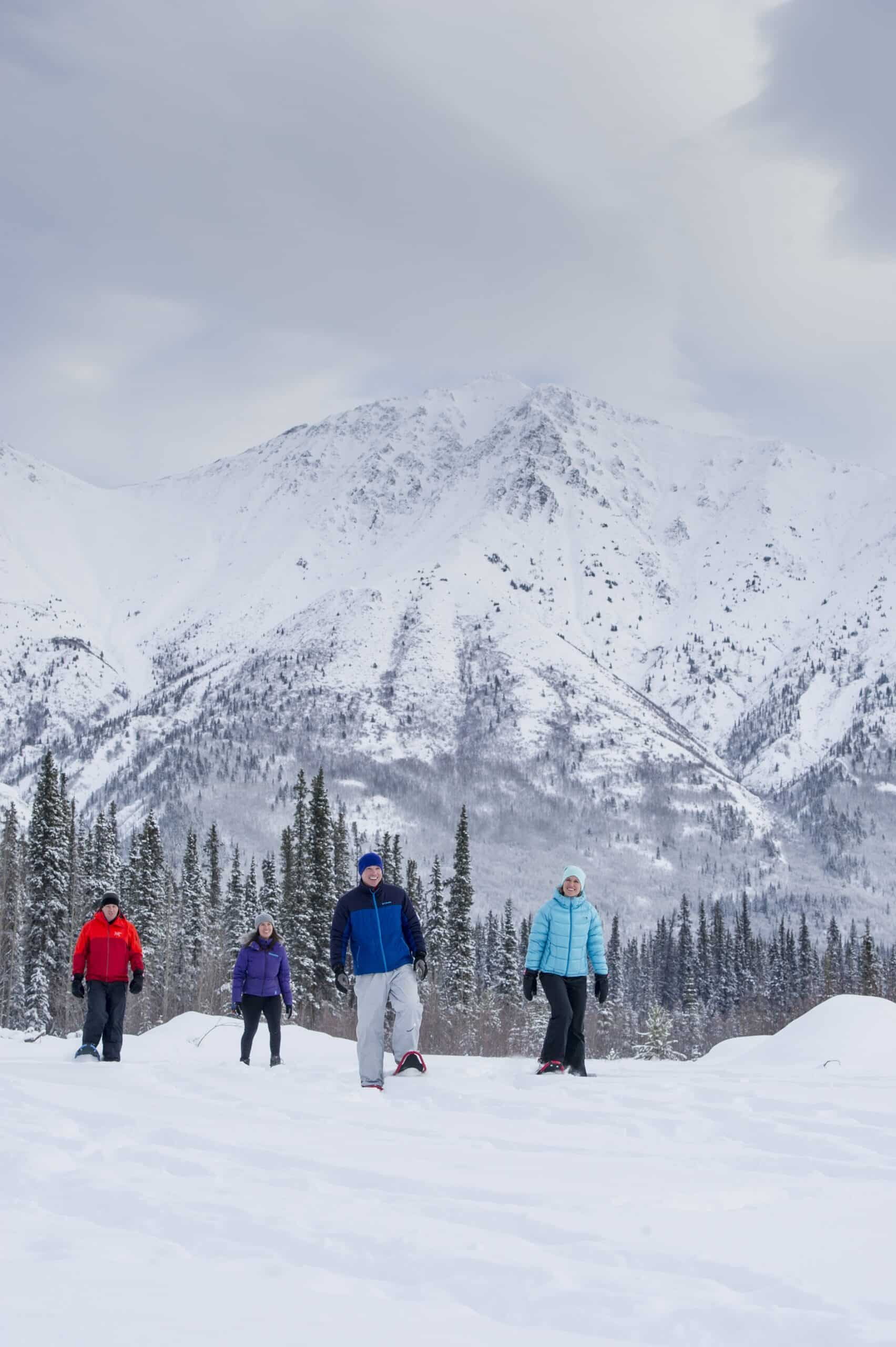 https://www.discovercanadatours.com/wp-content/uploads/2023/01/snowshoes-32426-1-scaled.jpg