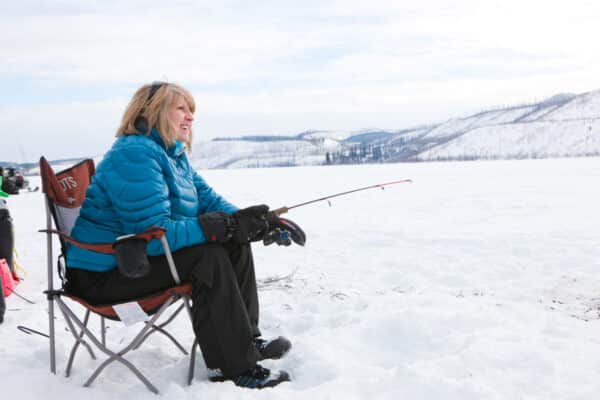 https://www.discovercanadatours.com/wp-content/uploads/2023/05/Ice-fishing-2-©Govt-of-Yukon-Fritz-Mueller_72-600x400.jpg