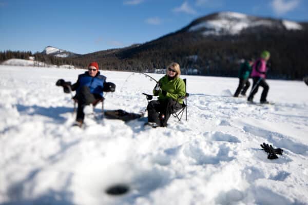 https://www.discovercanadatours.com/wp-content/uploads/2023/05/Ice-fishing-©Govt-of-Yukon_72-600x400.jpg