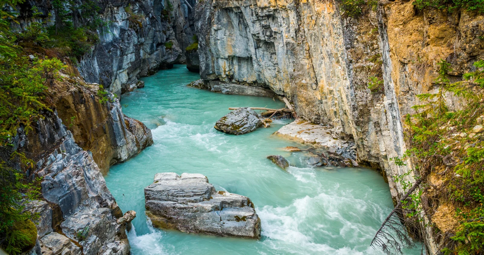 https://www.discovercanadatours.com/wp-content/uploads/2025/05/Marble-Canyon-©British-Columbia.webp