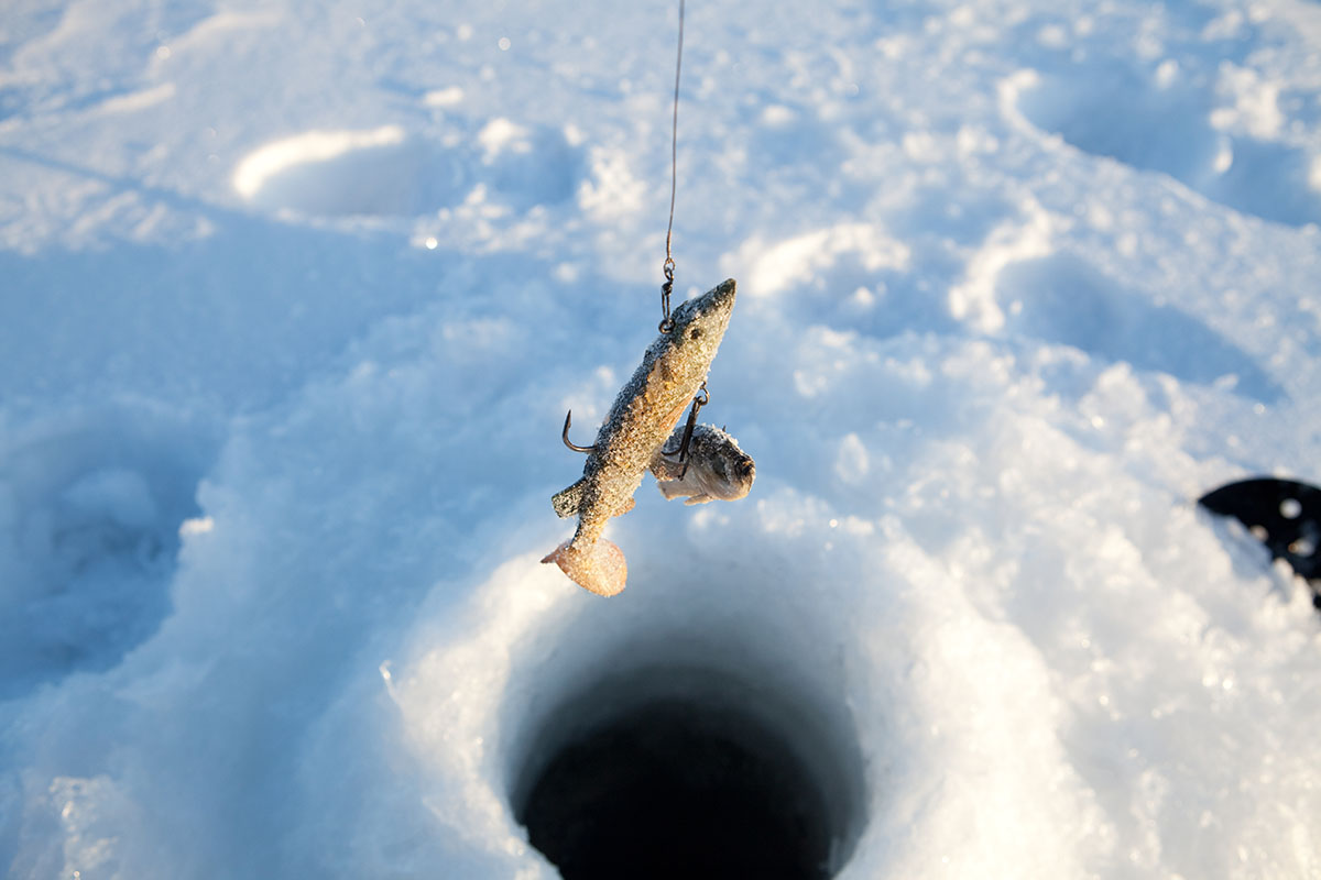 https://www.discovercanadatours.com/wp-content/uploads/2025/09/©NWTTourism-CTC-IceFishing-2.jpg