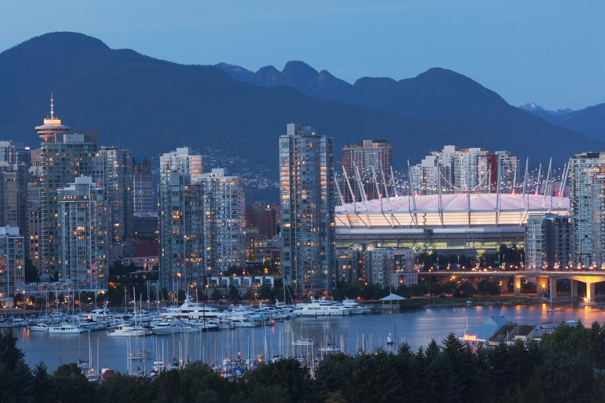 https://www.discovercanadatours.com/wp-content/uploads/2026/05/©DestinationBC-AlbertNormandin-FalseCreekandBCPlace-1200x800-1.jpg