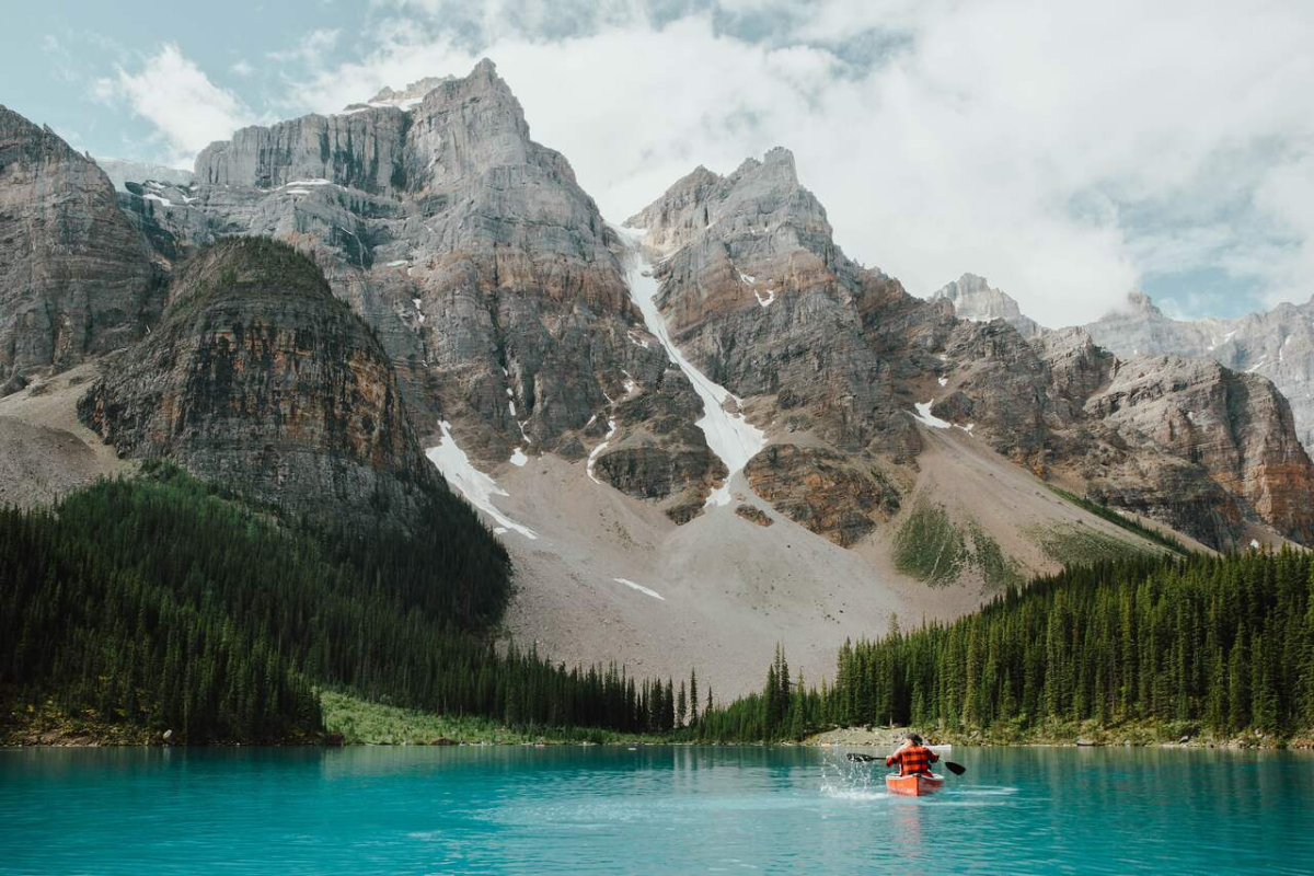 https://www.discovercanadatours.com/wp-content/uploads/2026/05/©MikeSeehagel-MoraineLakeCanoe-1200x800-1.png